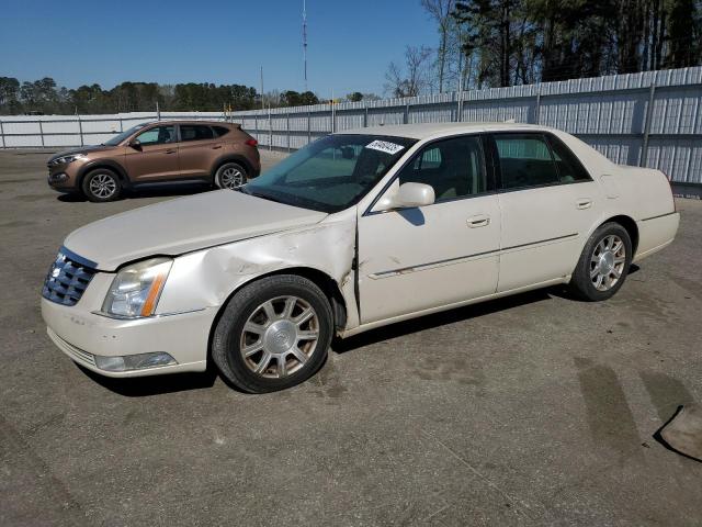 CADILLAC DTS 2010 with VIN 1G6KA5EY6AU123509 - Photo from auction