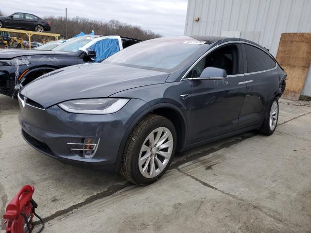 TESLA MODEL X 2018 with VIN 5YJXCDE22JF138486 - Photo from auction
