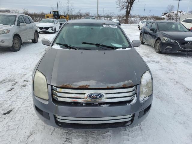 Photo 5 from auction – 2006 FORD FUSION SE with VIN 3FAFP07Z56R143003