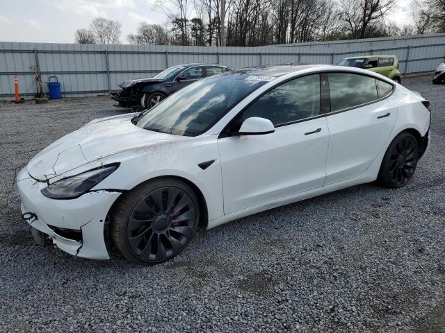 TESLA MODEL 3 2022 with VIN 5YJ3E1EC8NF274210 - Photo from auction