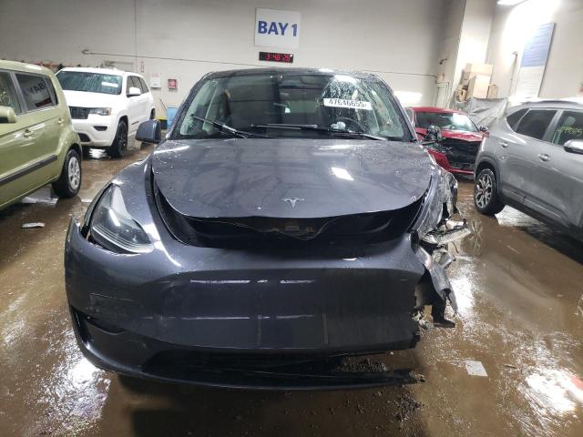 Photo 5 from auction – 2023 TESLA MODEL Y with VIN 7SAYGDEE0PF861882