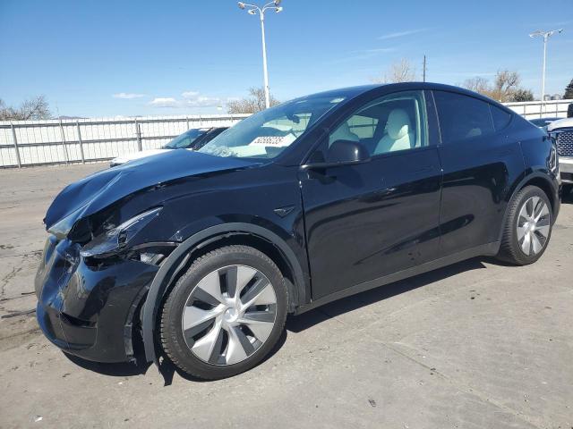 TESLA MODEL Y 2023 с VIN 7SAYGAEE0PF824894 - Фото с аукциона
