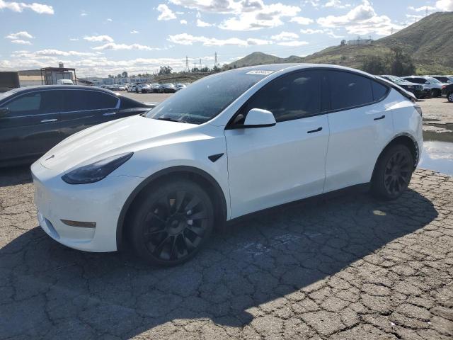 TESLA MODEL Y 2022 с VIN 7SAYGAEE7NF539249 - Снимка от търг