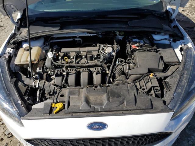 Photo 11 from auction – 2015 FORD FOCUS SE with VIN 1FADP3K22FL283740