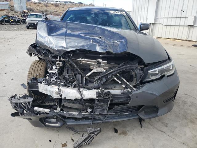 Photo 5 from auction – 2022 BMW 330XI with VIN 3MW5R7J09N8C56232