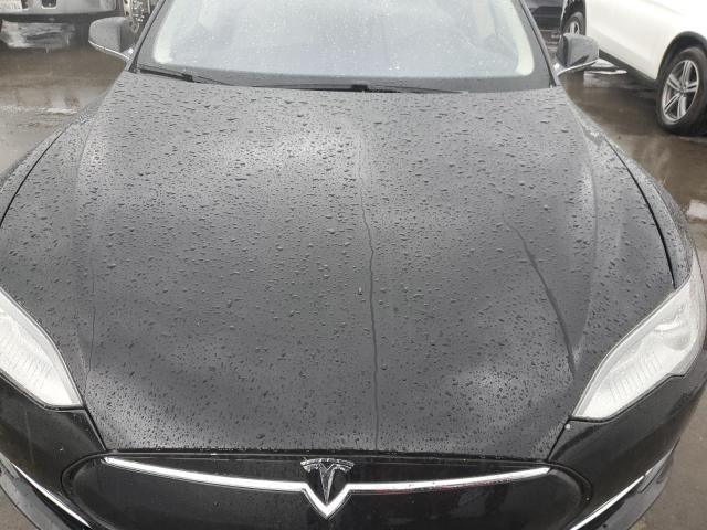Снимка 11 от търг – 2013 TESLA MODEL S с VIN 5YJSA1DNXDFP19684