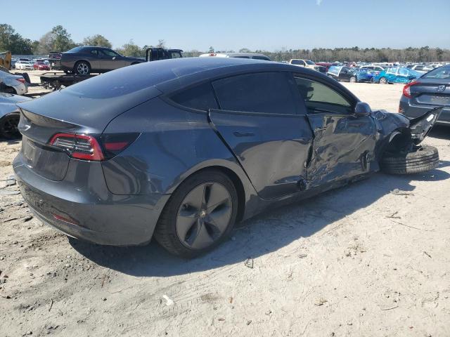 Снимка 3 от търг – 2018 TESLA MODEL 3 с VIN 5YJ3E1EAXJF016344