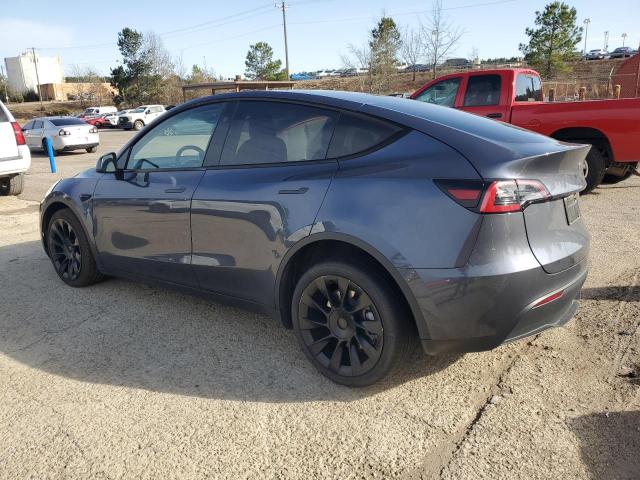 Снимка 2 от търг – 2023 TESLA MODEL Y с VIN 7SAYGDEE9PA163476