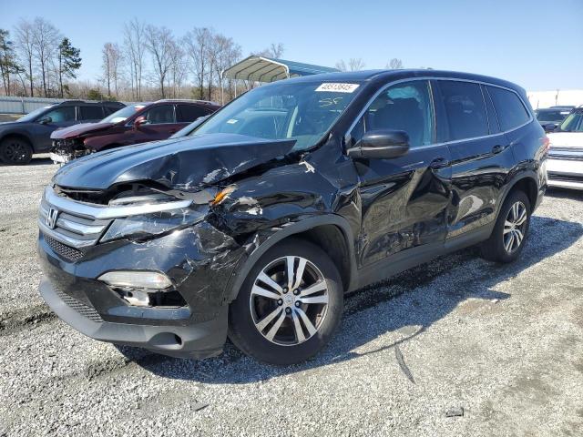 HONDA PILOT EXL 2017 with VIN 5FNYF6H59HB095451 - Photo from auction