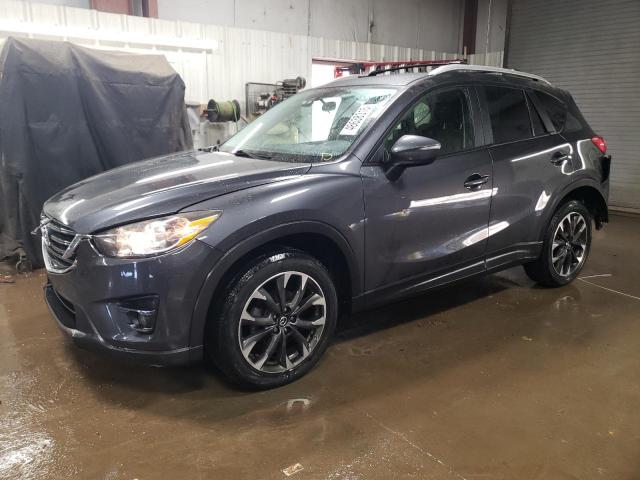 MAZDA CX-5 GT 2016 with VIN JM3KE4DYXG0647637 - Photo from auction