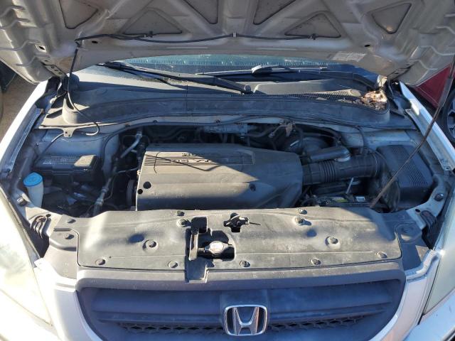 Photo 12 from auction – 2004 HONDA PILOT EX with VIN 2HKYF18494H608655
