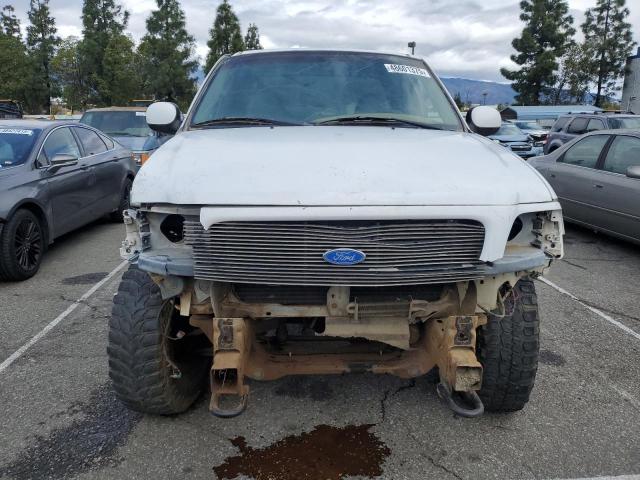 Photo 5 from auction – 2002 FORD F150 with VIN 1FTRX18L72NB03896
