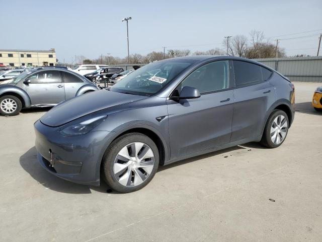 TESLA MODEL Y 2023 with VIN 7SAYGDEE3PA208718 - Photo from auction