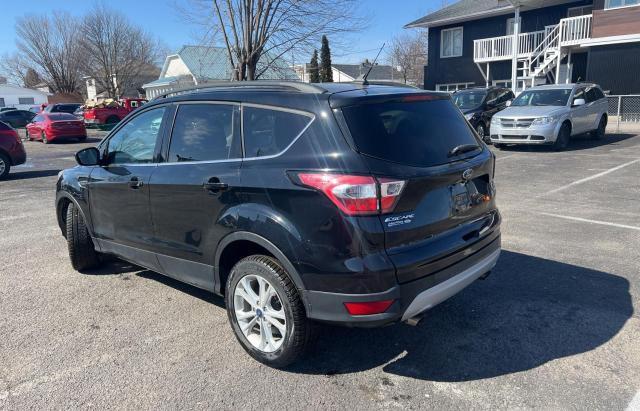 Photo 3 from auction – 2018 FORD ESCAPE SE with VIN 1FMCU0GD4JUD10233