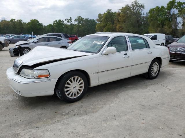 LINCOLN TOWN CAR U 2004 with VIN 1LNHM83W44Y669106 - Photo from auction