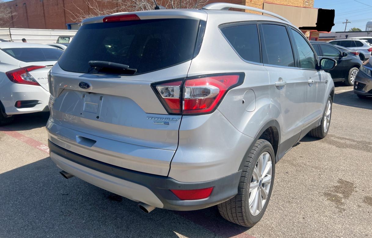 Photo 4 from auction – 2017 FORD ESCAPE TIT with VIN 1FMCU9J99HUE18253