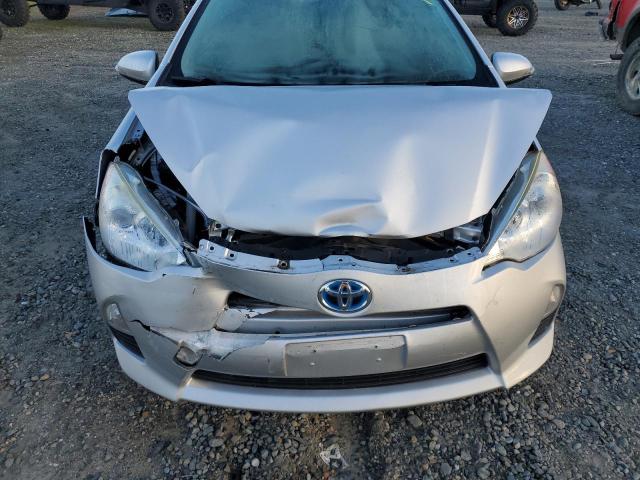 Photo 11 from auction – 2014 TOYOTA PRIUS C with VIN JTDKDTB31E1073515