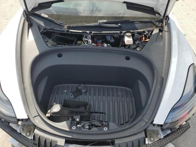 Снимка 11 от търг – 2022 TESLA MODEL 3 с VIN 5YJ3E1EB4NF167842