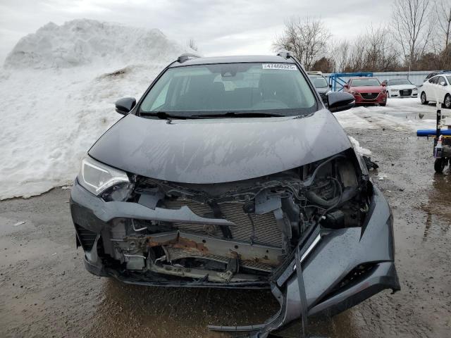 Photo 5 from auction – 2018 TOYOTA RAV4 LE with VIN 2T3BFREV1JW776795