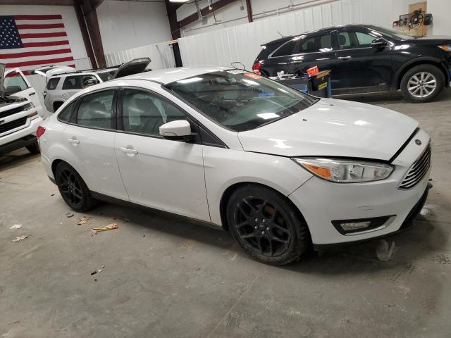 Photo 4 from auction – 2016 FORD FOCUS SE with VIN 1FADP3F27GL330188