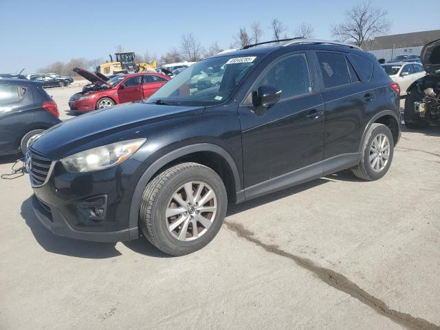 MAZDA CX-5 TOURI 2016 with VIN JM3KE2CY6G0829468 - Photo from auction