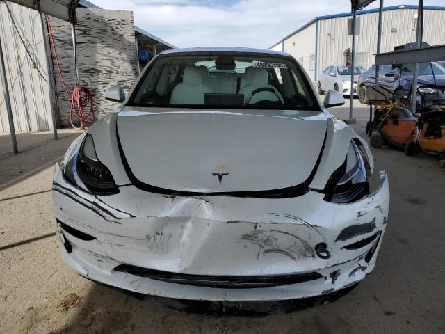Снимка 5 от търг – 2023 TESLA MODEL 3 с VIN 5YJ3E1EA6PF544830