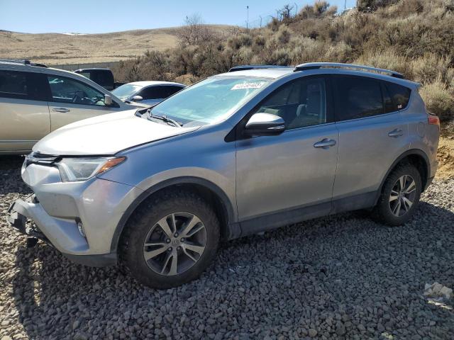 Photo 1 from auction – 2016 TOYOTA RAV4 XLE with VIN 2T3RFREV8GW470068