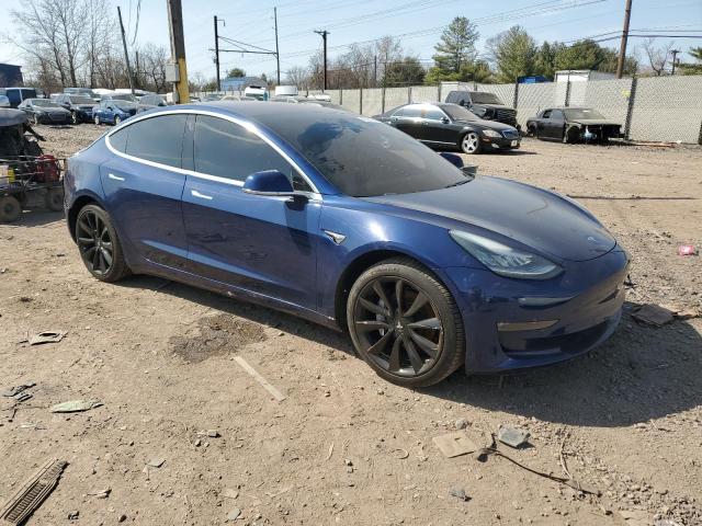 Снимка 4 от търг – 2018 TESLA MODEL 3 с VIN 5YJ3E1EB7JF117396