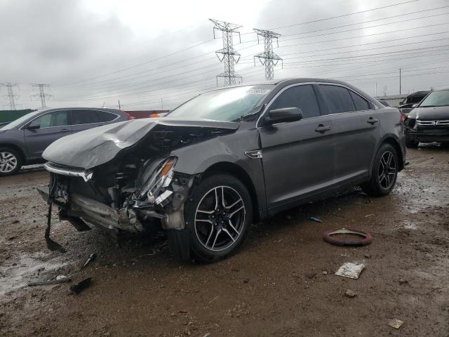 FORD TAURUS SEL 2015 with VIN 1FAHP2E8XFG104350 - Photo from auction