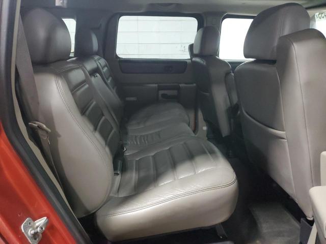 Снимка 11 от търг – 2003 HUMMER H2 с VIN 5GRGN23U03H113929