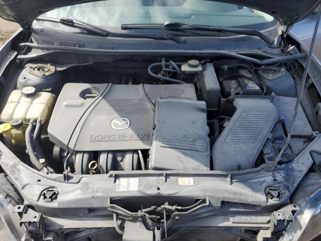 Снимка 11 от търг – 2004 MAZDA 3 I с VIN JM1BK12F941210607