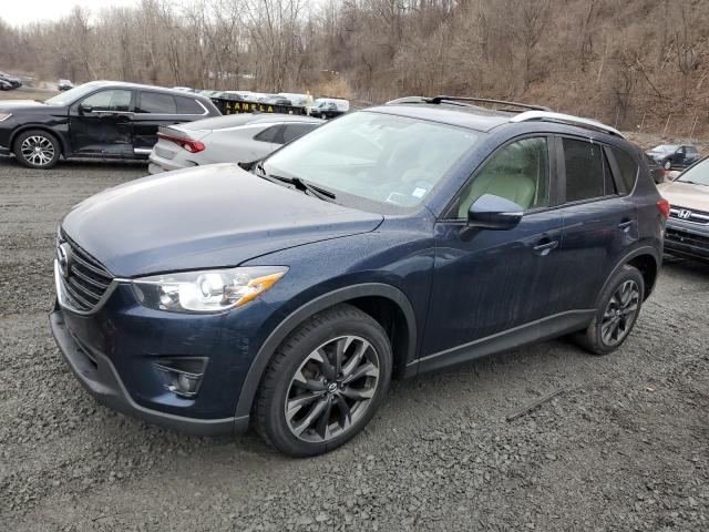 MAZDA CX-5 GT 2016 с VIN JM3KE4DY2G0909344 - Снимка от търг
