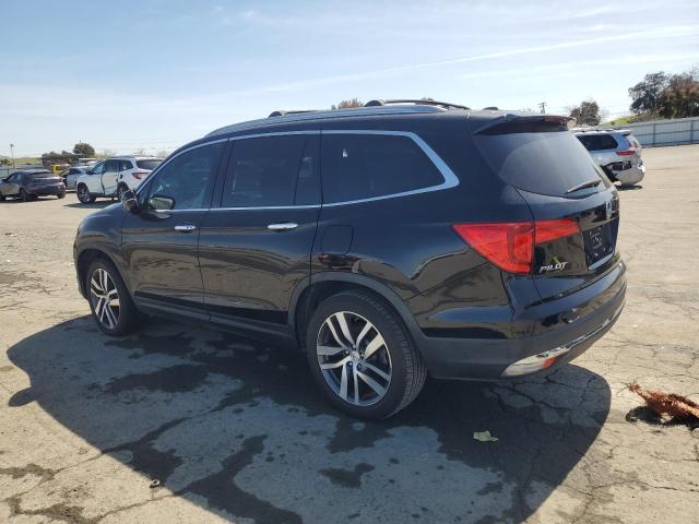 Photo 2 from auction – 2016 HONDA PILOT TOUR with VIN 5FNYF6H98GB076410