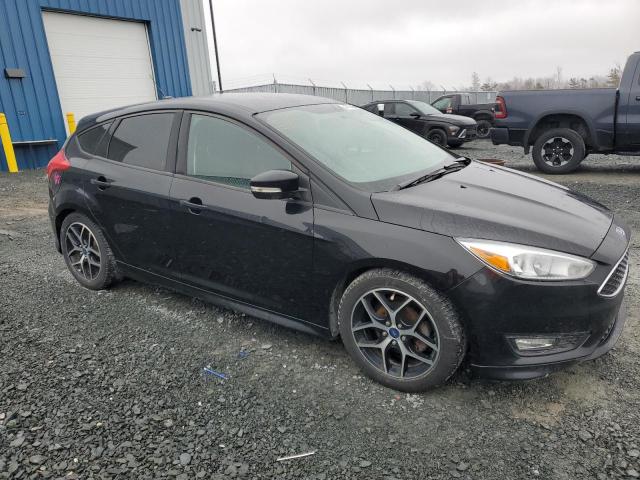 Photo 4 from auction – 2018 FORD FOCUS SE with VIN 1FADP3K24JL305780
