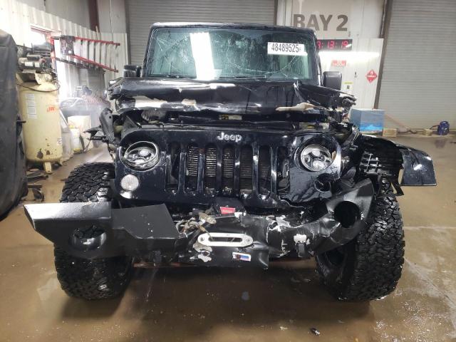 Photo 5 from auction – 2015 JEEP WRANGLER U with VIN 1C4HJWFG4FL676868