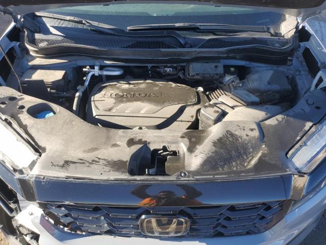 Photo 12 from auction – 2022 HONDA PASSPORT E with VIN 5FNYF8H09NB027162