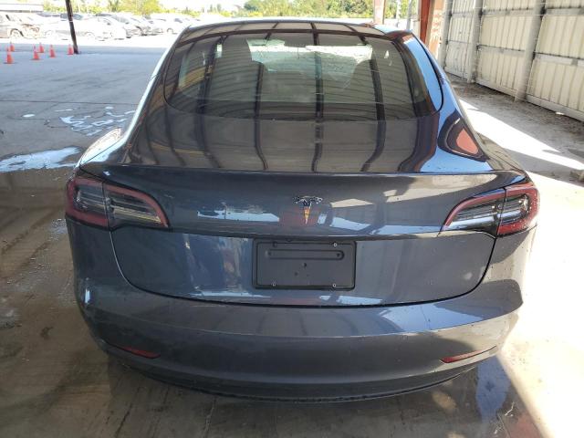 Снимка 6 от търг – 2022 TESLA MODEL 3 с VIN 5YJ3E1EA4NF285493