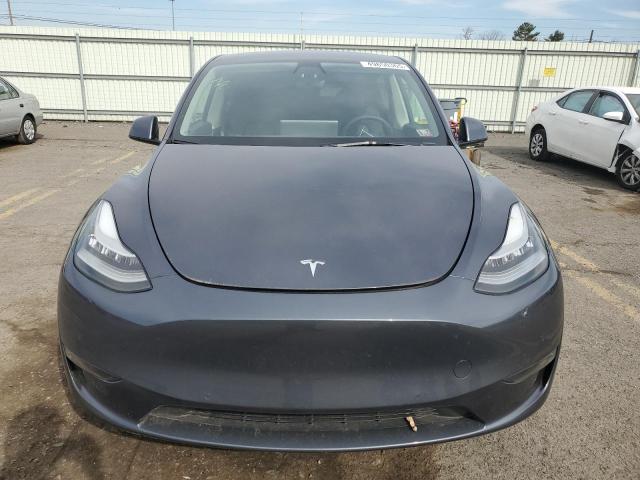 Снимка 5 от търг – 2022 TESLA MODEL Y с VIN 7SAYGDEE0NF378356