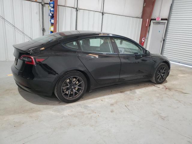Снимка 3 от търг – 2022 TESLA MODEL 3 с VIN 5YJ3E1EA6NF190076