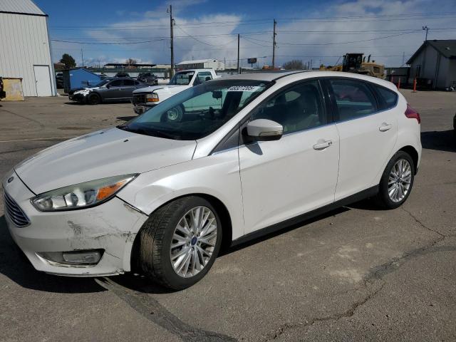 FORD FOCUS TITA 2015 with VIN 1FADP3N25FL211247 - Photo from auction