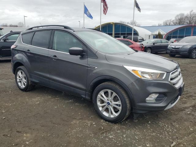 Photo 4 from auction – 2018 FORD ESCAPE SE with VIN 1FMCU9GD8JUB76153