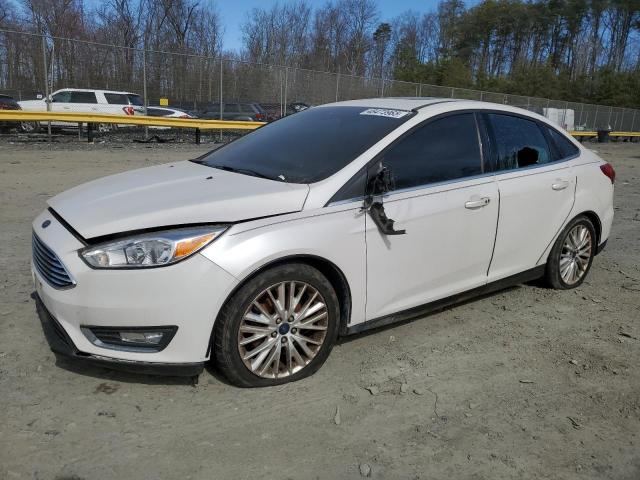 FORD FOCUS TITA 2015 with VIN 1FADP3J28FL378093 - Photo from auction