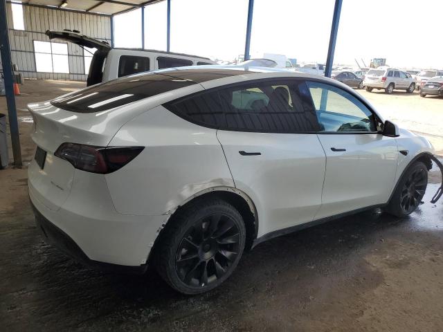 Снимка 3 от търг – 2023 TESLA MODEL Y с VIN 7SAYGDEE2PA050503