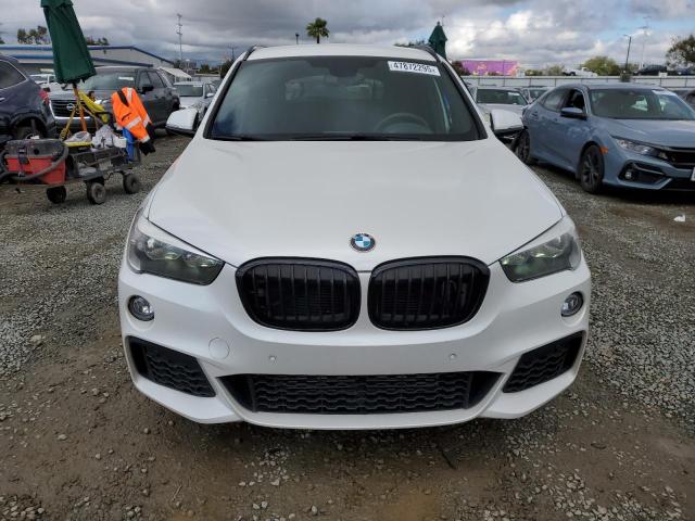 Photo 5 from auction – 2016 BMW X1 XDRIVE2 with VIN WBXHT3C32G5E55579