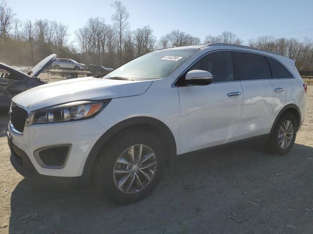 KIA SORENTO 2016 with VIN 5XYPG4A39GG055111 - Photo from auction