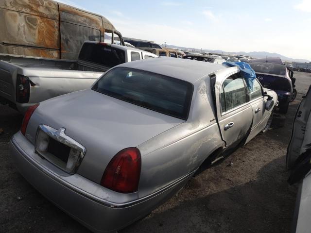 Photo 3 from auction – 2000 LINCOLN TOWN CAR E with VIN 1LNHM81W3YY824379