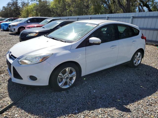 FORD FOCUS SE 2013 with VIN 1FADP3K22DL302722 - Photo from auction