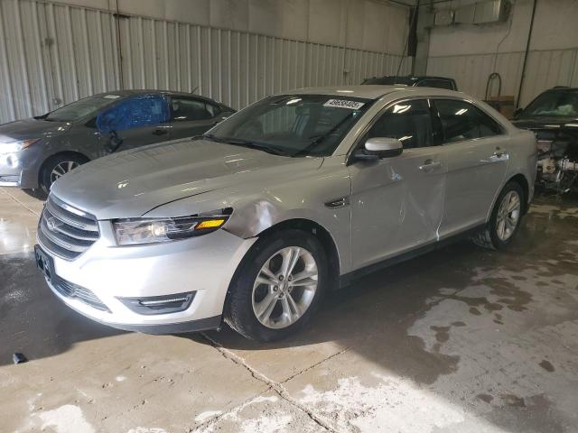 FORD TAURUS SEL 2015 with VIN 1FAHP2E8XFG130348 - Photo from auction