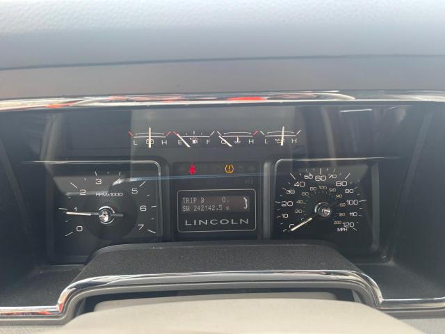 Photo 9 from auction – 2011 LINCOLN NAVIGATOR with VIN 5LMJJ3J57BEJ02018