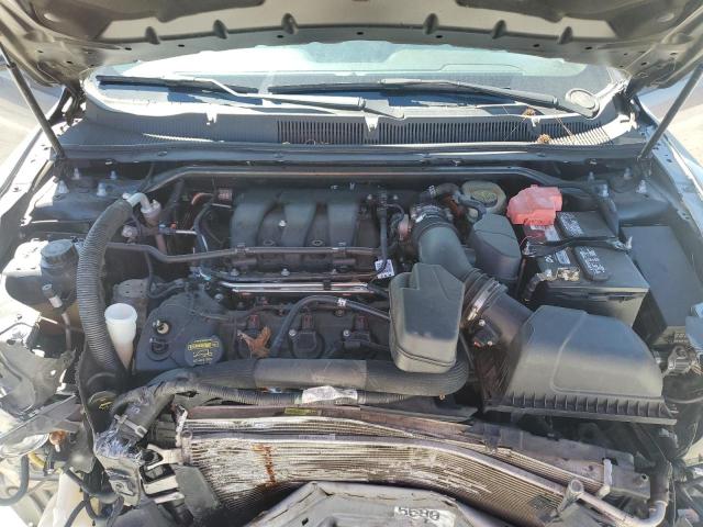 Снимка 11 от търг – 2014 FORD TAURUS с VIN 1FAHP2F87EG113827